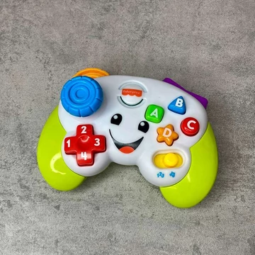 Fisher Price Manolex német nyelvű interaktív kar babajáték