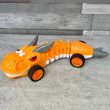 Pepco zenélő, guruló narancssárga sárkány játék