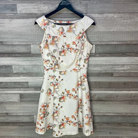 Orsay világos virágmintás alkalmi ruha 38