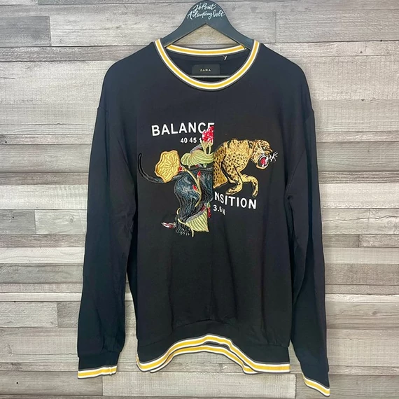 Laza fekete tigrismintás pulóver L