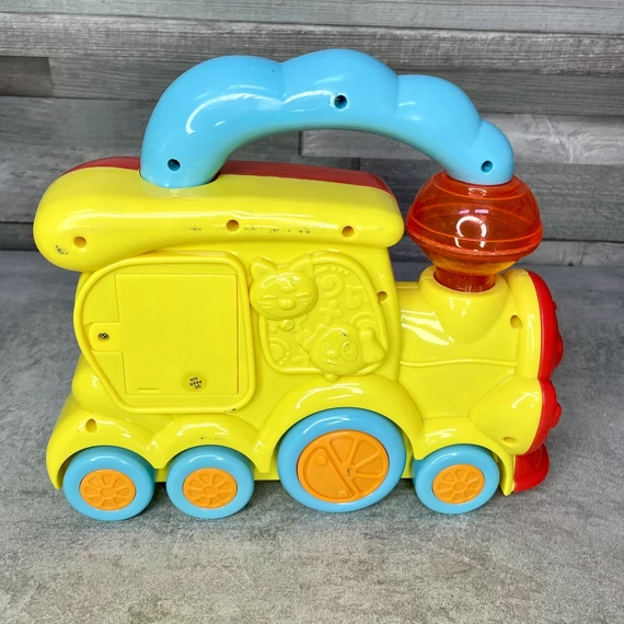 Színes állathangos, világító játék vonat