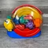 Kép 1/4 - Fisher-Price formabedobó csiga logikai játék