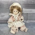 Kép 1/4 - Púder ruhás porcelánbaba