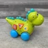 Kép 3/4 - Huile Toys zenélő, guruló dinó játék
