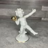 Kép 1/4 - Német aranyozott diszkoszvető porcelán Puttó figura