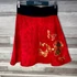 Kép 1/4 - Desigual piros-arany mintás női szoknya XS