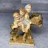Figurine Alabastru I.I.L.Fagaras szamárháton utazó gyerekek szobor dísz
