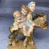 Figurine Alabastru I.I.L.Fagaras szamárháton utazó gyerekek szobor dísz